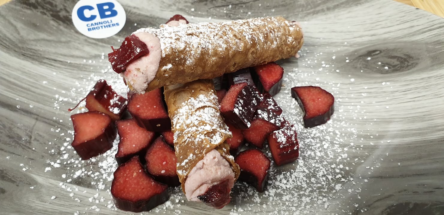 Eternal happiness is rhubarb cannoli.
A rhubarb what? A rhubarb Cannoli!

Roasted Ruby Red Rhubarb rippled through fresh ricotta with vanilla bean. Tangy, sweet and creamy.

This weekend at the slinging at the following places:

SATURDAY:
Capital Region Farmers Market, Canberra at EPIV
7am to 11:30am
Old Bus Depot Markets Kingston,
Canberra Wool Expo 9:30am to 2:30pm
www.facebook.com/events/641459648627394

SUNDAY:
Haig Park Village Markets Braddon 8am to 2pm
Old Bus Depot Markets Kingston,
Canberra Wool Expo 9:30am to 2:30pm
www.facebook.com/events/641459648627394

Flavours:
Vanilla Bean Crema.
Chocolate and Wild Orange Crema.
Pistachio Ricotta.
Passionfruit Mascarpone.
Roasted Rhubarb and Vanilla ricotta.
Raspberry Ripple Ricotta.
Traditional Siciliano Ricotta.
Chocolate Coconut Crema.
Rare Roast Beef with fresh Wasabi.

Hope to see u all this weekend
Papa and the Team.

#cannoli #glutenfree  #cannoligetemhere  #vegan #hercanberra #visitnsw #EventsACT #canberra #canberraeats #canberralife #canberralocals #cbr #eatlocal #eatcanberra #canberrasmallbusiness #visitcanberra #wearecbr  #foodporn  #canberrabusiness #cbreats
#haigparkvillagemarkets
#oldbusdepotmarkets
#crfarmersmarket
#capitalregionfarmersmarket
#thelittleburleymarket